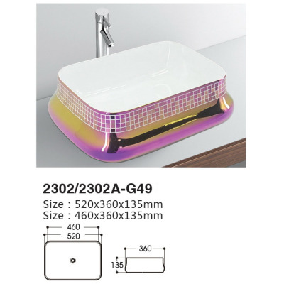 Colorful art basin installed on ceramic table