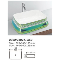 Colorful art basin installed on ceramic table